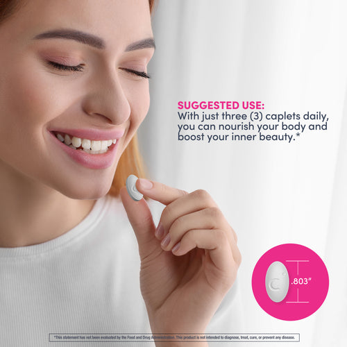 Woman holding a supplement capsule with product information on a white background