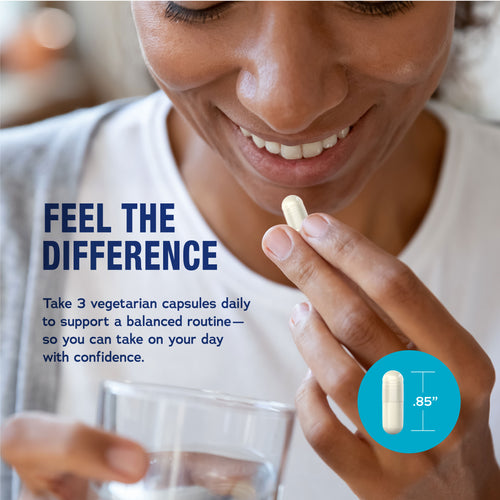 Woman holding a supplement capsule with text about taking vegetarian capsules daily.