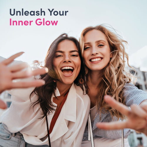 Two women taking a selfie with text 'Unleash Your Inner Glow' on a light background