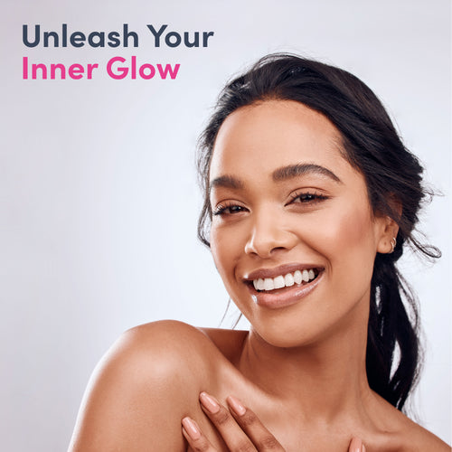 Woman with a radiant smile and 'Unleash Your Inner Glow' text on a light gray background