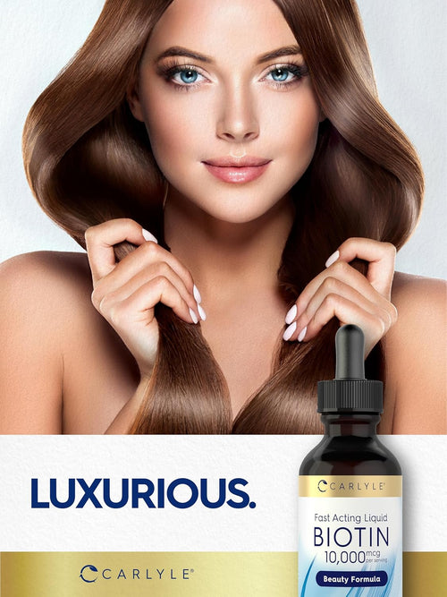 Woman with long brown hair holding it, next to a bottle of Carlyle Biotin supplement on a white background.