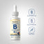 B-complex + B12 sublingual supplement bottle with features on a light gray background