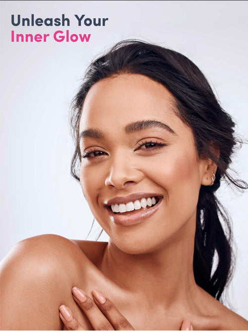 Woman with a radiant smile and text 'Unleash Your Inner Glow' on a light background