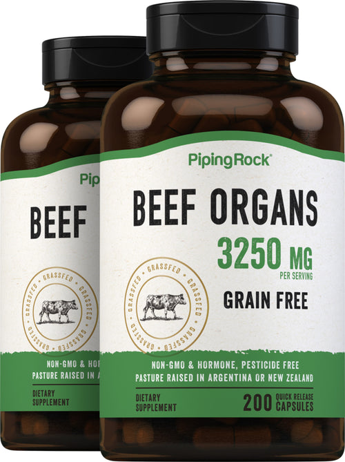 Two bottles of Piping Rock Beef Organs dietary supplement with green and white labels.