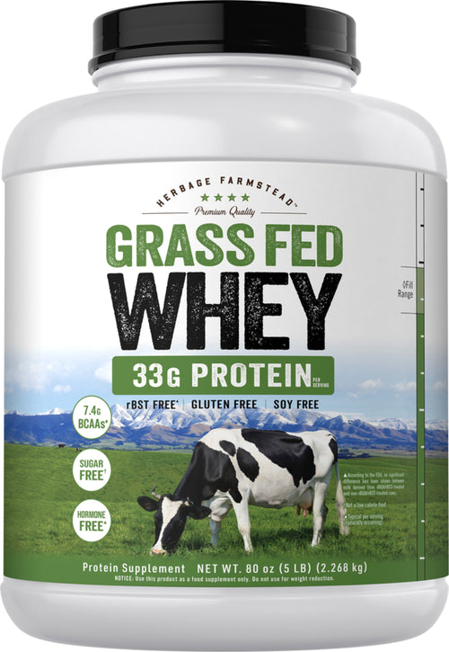 Container of Heritage Farmstead Grass Fed Whey protein powder with a cow on the label.