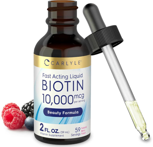 Carlyle Biotin supplement bottle with dropper and berries on a white background